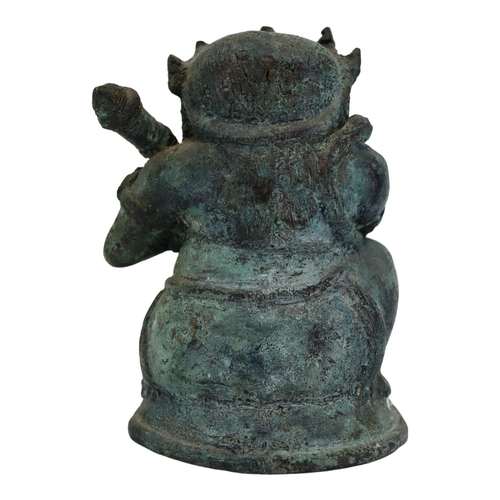 145 - AN INDONESIAN, JAVANESE FIGURE OF BATHARA KALA/BHOMA
Holding a gada (cudgel). 
(h 13.5cm x w 10.5cm ... 