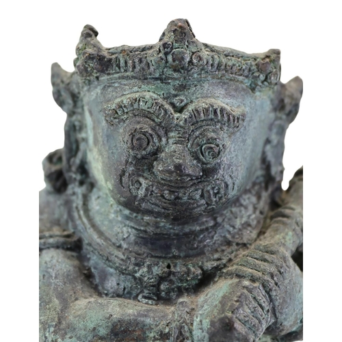 145 - AN INDONESIAN, JAVANESE FIGURE OF BATHARA KALA/BHOMA
Holding a gada (cudgel). 
(h 13.5cm x w 10.5cm ... 