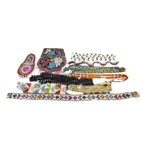 151 - A COLLECTION OF 19TH AND 20TH CENTURY NATIVE AMERICAN BEADED ITEMS.
