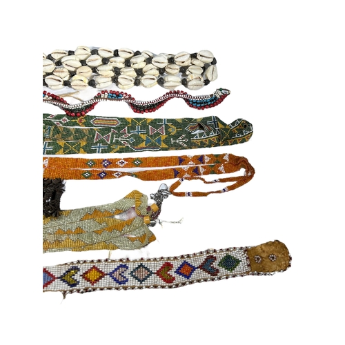 151 - A COLLECTION OF 19TH AND 20TH CENTURY NATIVE AMERICAN BEADED ITEMS.