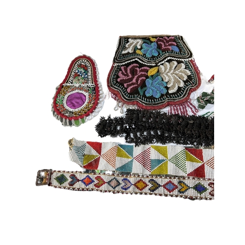 151 - A COLLECTION OF 19TH AND 20TH CENTURY NATIVE AMERICAN BEADED ITEMS.