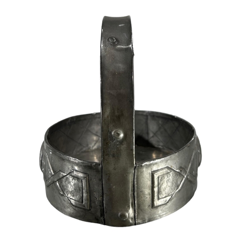 169 - AN ARTS & CRAFTS PEWTER BASKET HAVING MOLTEN GLASS CABOCHON INSERTS.
(h 13.6cm x d 13.8cm)