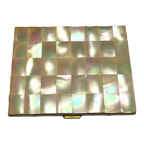 170 - A VINTAGE 1950’S MOTHER OF PEARL AND GILT METAL CIGARETTE CASE/COMPACT.
(10.2cm x 8.2cm)