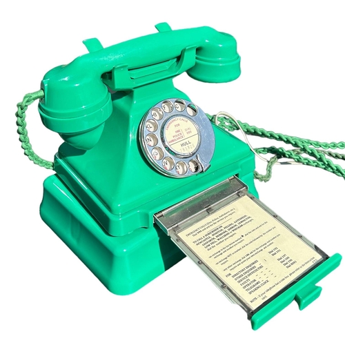 205 - A 1950’S TYPE 232 SERIES GREEN BAKELITE TELEPHONE AND TERMINAL BOX, Impressed marked 164, 56, exchan... 