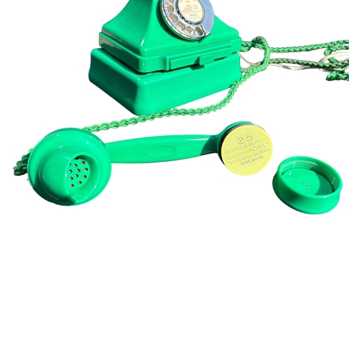205 - A 1950’S TYPE 232 SERIES GREEN BAKELITE TELEPHONE AND TERMINAL BOX, Impressed marked 164, 56, exchan... 