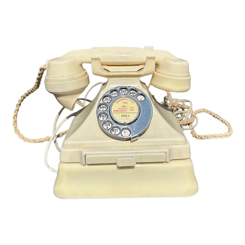 206 - A 1950’S TYPE 232 SERIES IVORY BAKELITE TELEPHONE AND TERMINAL BOX
Impressed marked 164, 50, exchang... 