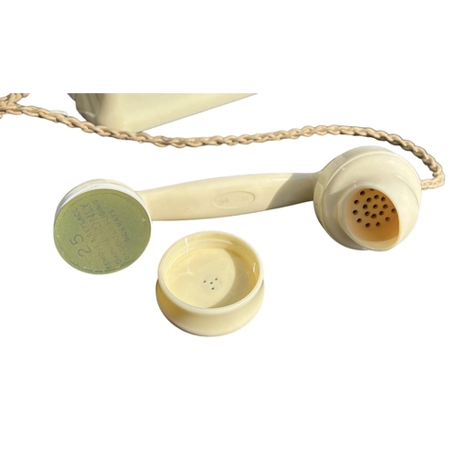 206 - A 1950’S TYPE 232 SERIES IVORY BAKELITE TELEPHONE AND TERMINAL BOX
Impressed marked 164, 50, exchang... 