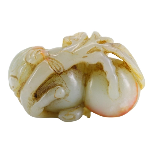 121 - A CHINESE PALE GREEN AND RED VEINED JADE ‘POMEGRANATES & BOY’ CARVING
Two pomegranates with boy clin... 