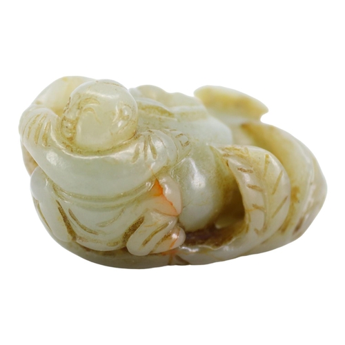 121 - A CHINESE PALE GREEN AND RED VEINED JADE ‘POMEGRANATES & BOY’ CARVING
Two pomegranates with boy clin... 