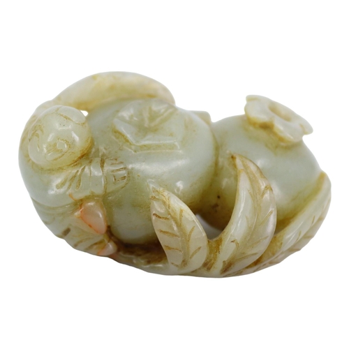 121 - A CHINESE PALE GREEN AND RED VEINED JADE ‘POMEGRANATES & BOY’ CARVING
Two pomegranates with boy clin... 
