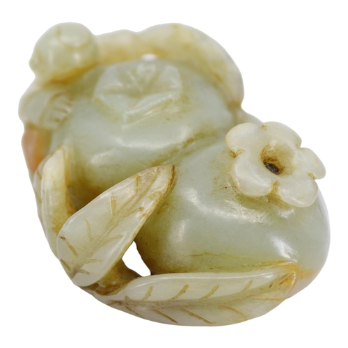 121 - A CHINESE PALE GREEN AND RED VEINED JADE ‘POMEGRANATES & BOY’ CARVING
Two pomegranates with boy clin... 