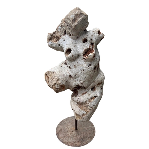 156 - POSSIBLY GREEK, A HEAVY PERFORATED CARVED STONE NUDE FEMALE FIGURE, POSSIBLY OF APHRODITE, MOUNTED O... 