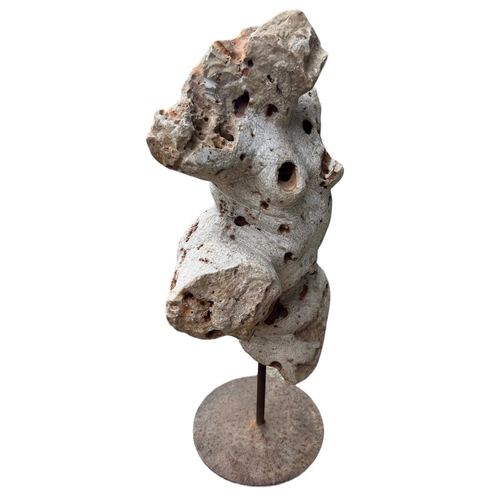 156 - POSSIBLY GREEK, A HEAVY PERFORATED CARVED STONE NUDE FEMALE FIGURE, POSSIBLY OF APHRODITE, MOUNTED O... 