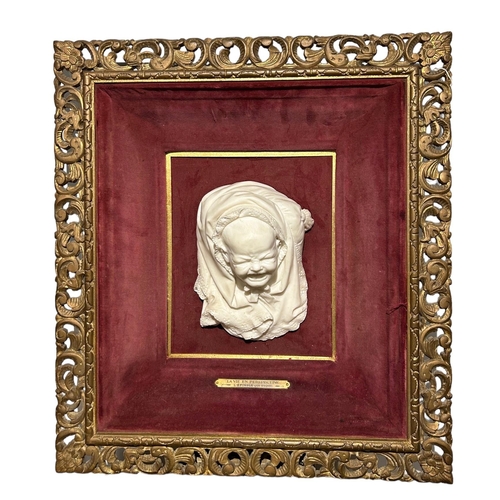 213 - A 19TH CENTURY CARVED PORTRAIT BUST OF A BABY CRYING IN SHAWL, TITLED ‘THE PIN THAT PRICKS’ FROM THE... 