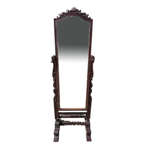 225 - A CHINESE CARVED HARDWOOD CHEVELLE MIRROR
Decorated with scrolling foliage, raised on scrolling feet... 