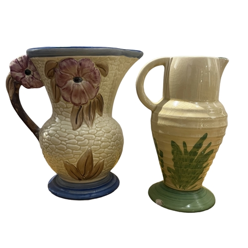 140 - WADEHEATH, ENGLAND. TWO ART DECO POTTERY JUGS, CIRCA 1930’S
Marked to undersides.
(largest h 19.3cm ... 