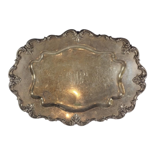 35A - FRANK M. WHITING CO., A LARGE EARLY 20TH CENTURY AMERICAN SILVER TRAY
Having high relief scrolling b... 