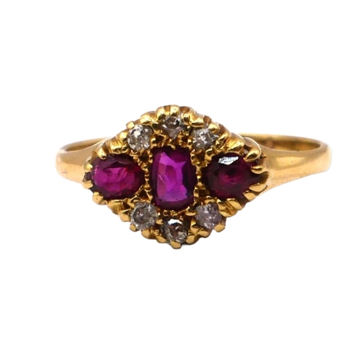 47 - A YELLOW METAL RUBY AND DIAMOND RING, YELLOW METAL TESTED AS 18CT YELLOW GOLD
Stylized rhombus mount... 