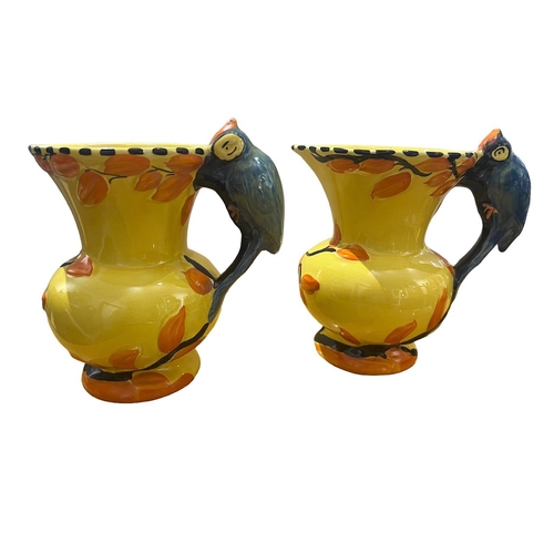 78A - WADEHEATH, ENGLAND POTTERY, TWO ART DECO WOODPECKER JUGS, CIRCA 1930
All having yellow ground, styli... 