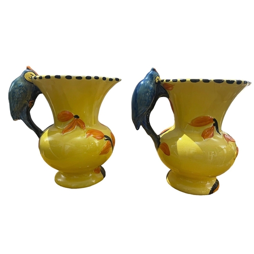 78A - WADEHEATH, ENGLAND POTTERY, TWO ART DECO WOODPECKER JUGS, CIRCA 1930
All having yellow ground, styli... 