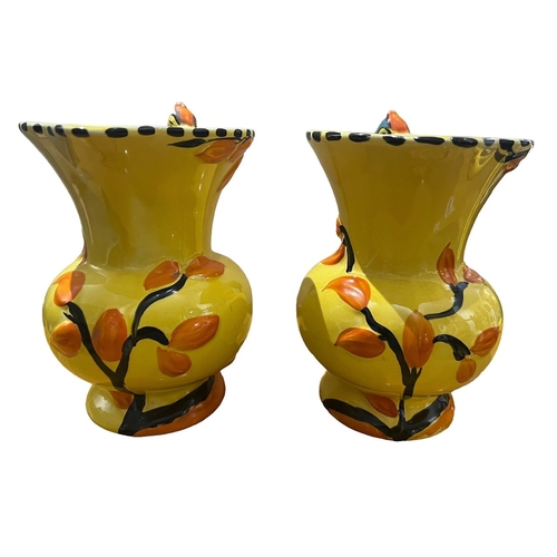 78A - WADEHEATH, ENGLAND POTTERY, TWO ART DECO WOODPECKER JUGS, CIRCA 1930
All having yellow ground, styli... 