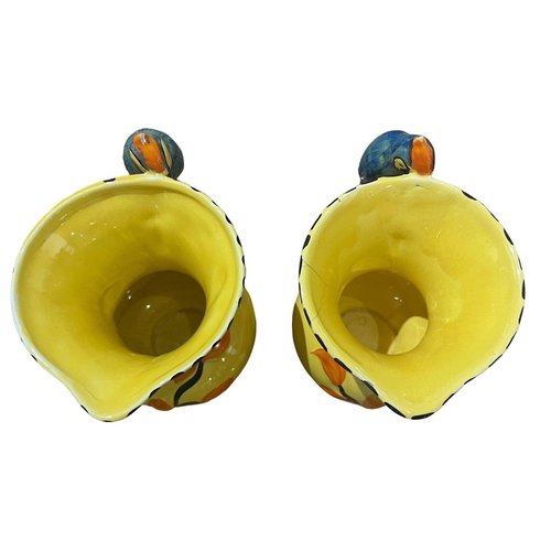 78A - WADEHEATH, ENGLAND POTTERY, TWO ART DECO WOODPECKER JUGS, CIRCA 1930
All having yellow ground, styli... 