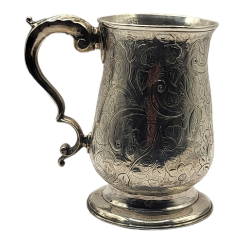 4 - JOHN KING, A GEORGE III SILVER MUG, HALLMARKED LONDON, 1776
Decorated with elaborate chased and engr... 