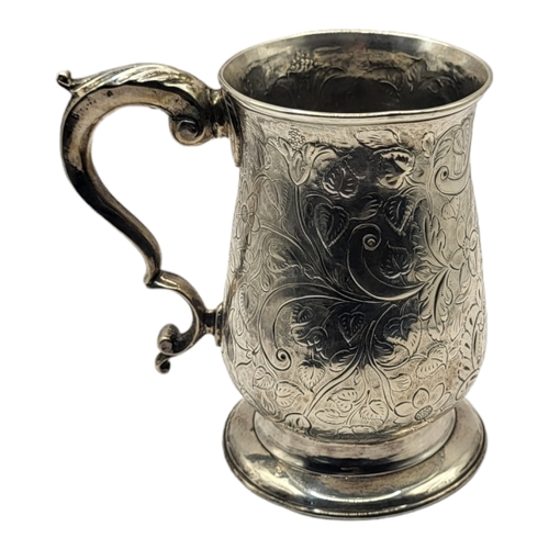 4 - JOHN KING, A GEORGE III SILVER MUG, HALLMARKED LONDON, 1776
Decorated with elaborate chased and engr... 