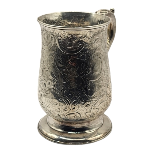 4 - JOHN KING, A GEORGE III SILVER MUG, HALLMARKED LONDON, 1776
Decorated with elaborate chased and engr... 