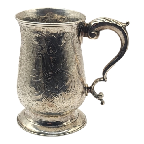 4 - JOHN KING, A GEORGE III SILVER MUG, HALLMARKED LONDON, 1776
Decorated with elaborate chased and engr... 