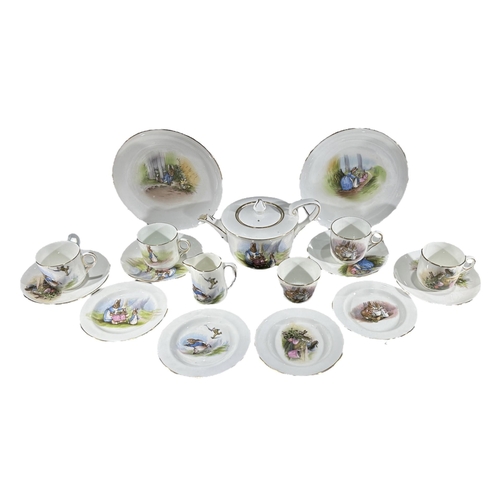 71 - GRIMWADES, BEATRIX POTTER, A 1920’S SMALL PORCELAIN PETER RABBIT PART TEA SET
Comprising teapot, cup... 