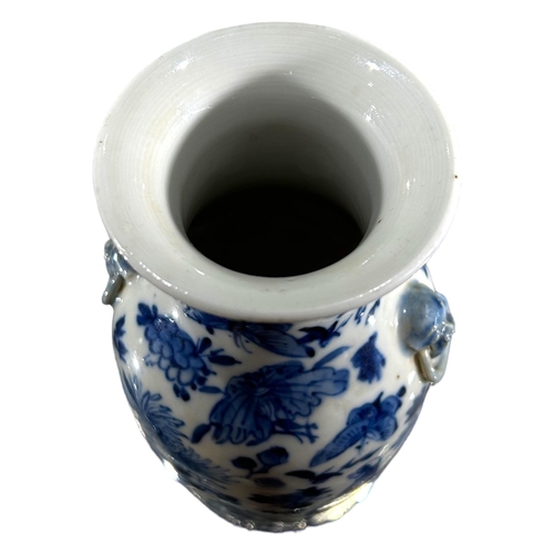 76 - A CHINESE BLUE AND WHITE VASE, BEARING KANGXI MARK TO UNDERSIDE
Decorated with birds, butterflies am... 