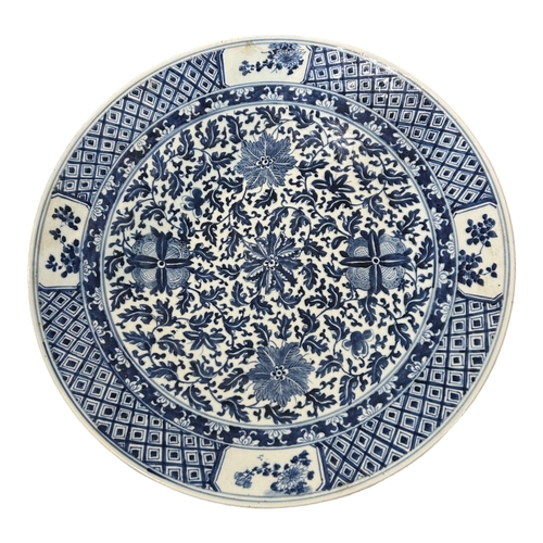 77 - LARGE AND IMPRESSIVE 18TH CENTURY CHINESE BLUE AND WHITE CHARGER, BEARING SIX CHARACTER KANGXI MARK ... 