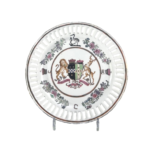 79 - A CHINESE EXPORT PORCELAIN PLATE BEARING THE BRITISH ARMS OF PITT IMPALING GRANVILLE
Decorated with ... 