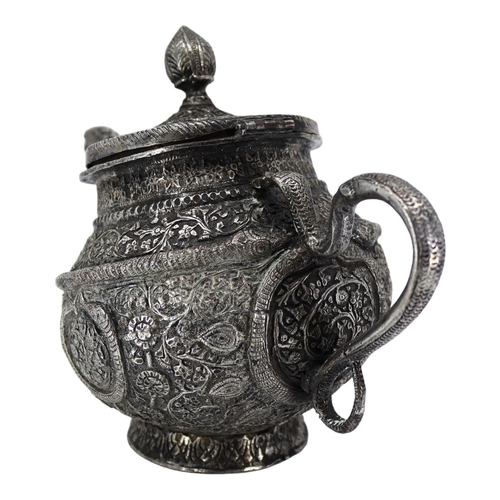 16A - A HEAVY LATE 19TH/EARLY 20TH CENTURY INDIAN RAJ PERIOD KASHMIRI SILVER TEAPOT OF TIPPED KANG FORM
Ch... 