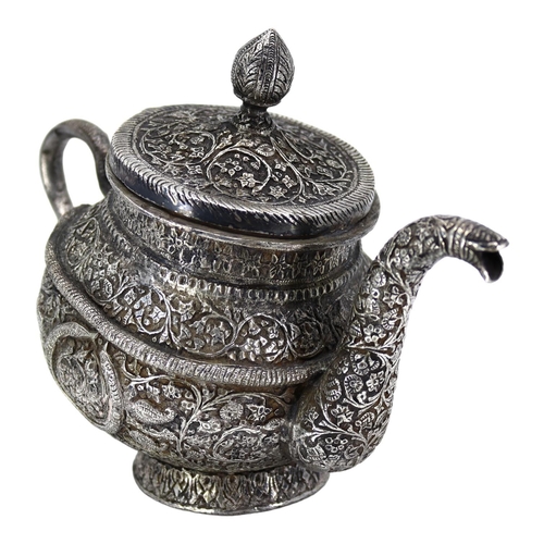 16A - A HEAVY LATE 19TH/EARLY 20TH CENTURY INDIAN RAJ PERIOD KASHMIRI SILVER TEAPOT OF TIPPED KANG FORM
Ch... 