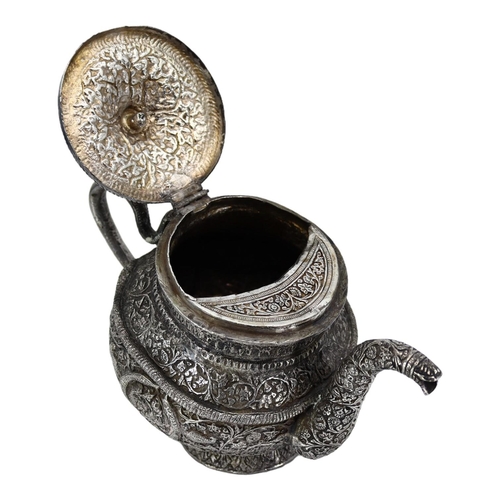 16A - A HEAVY LATE 19TH/EARLY 20TH CENTURY INDIAN RAJ PERIOD KASHMIRI SILVER TEAPOT OF TIPPED KANG FORM
Ch... 