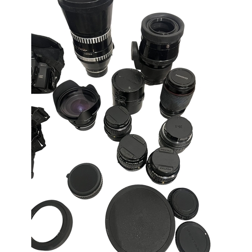 69A - A LARGE COLLECTION OF PENTAX CAMERA, LENSES AND STANDARDS.