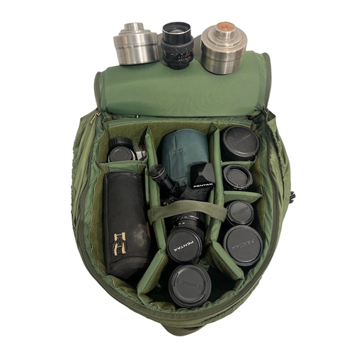 69A - A LARGE COLLECTION OF PENTAX CAMERA, LENSES AND STANDARDS.