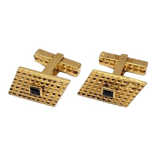 38 - PAIR OF EGYPTIAN 18CT YELLOW GOLD AND BLUE TOPAZ CUFFLINKS
Parallelogram fronts having central recta... 