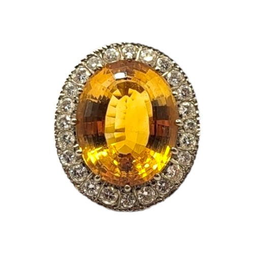 35 - LARGE VINTAGE 18CT GOLD, CITRINE AND DIAMOND COCKTAIL RING
The central oval cut Citrine (approx. 20m... 