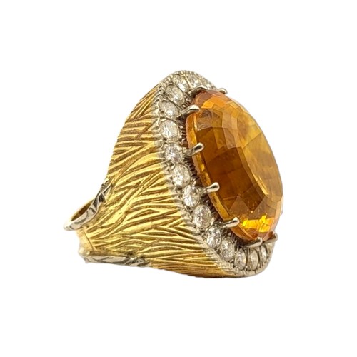 35 - LARGE VINTAGE 18CT GOLD, CITRINE AND DIAMOND COCKTAIL RING
The central oval cut Citrine (approx. 20m... 