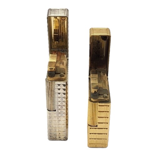 41 - ST. DUPONT, PARIS, TWO GOLD PLATED CIGARETTE LIGHTERS. 
(largest 6cm)