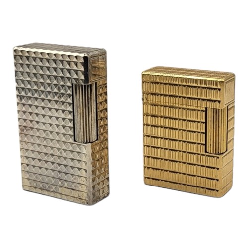 41 - ST. DUPONT, PARIS, TWO GOLD PLATED CIGARETTE LIGHTERS. 
(largest 6cm)