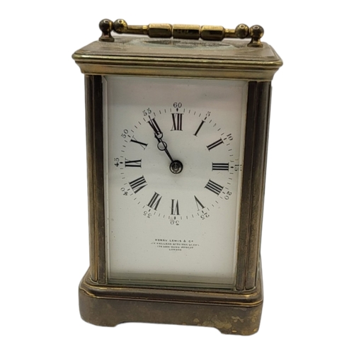 57A - HENRY LEWIS & CO., A 20TH CENTURY GILT METAL CARRIAGE CLOCK
Having white enamelled dial with Roman n... 