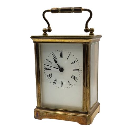 58A - 20TH CENTURY GILT METAL CARRIAGE CLOCK, HOUSED IN LATE 19TH/EARLY 20TH CENTURY LEATHER CARRIAGE CLOC... 