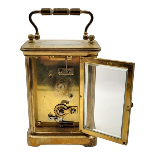 58A - 20TH CENTURY GILT METAL CARRIAGE CLOCK, HOUSED IN LATE 19TH/EARLY 20TH CENTURY LEATHER CARRIAGE CLOC... 