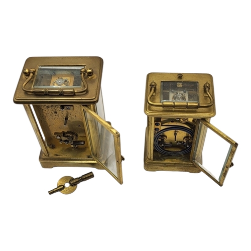 59A - TWO EARLY 20TH CENTURY GILT METAL CARRIAGE CLOCKS
Both having white enamelled dial with Roman numera... 