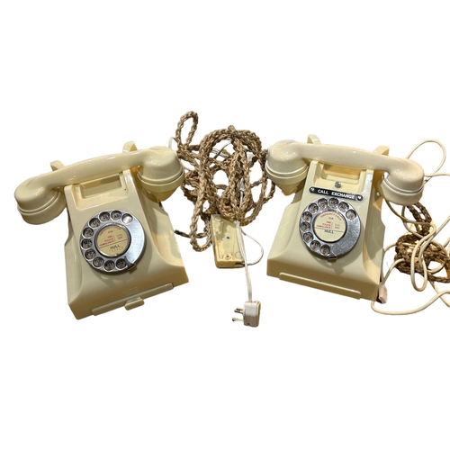 51B - TWO TYPE 232 SERIES WHITE TELEPHONES
Impressed and marked, one having exchange list drawer, both hav... 