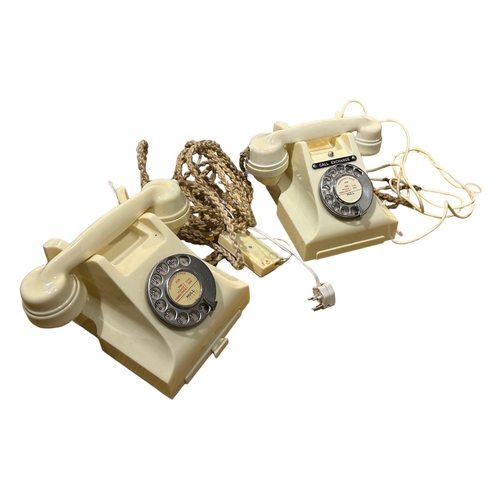 51B - TWO TYPE 232 SERIES WHITE TELEPHONES
Impressed and marked, one having exchange list drawer, both hav... 